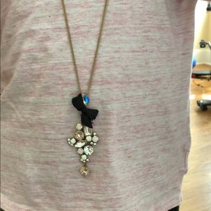 JCrew long necklace with stones and a black bow